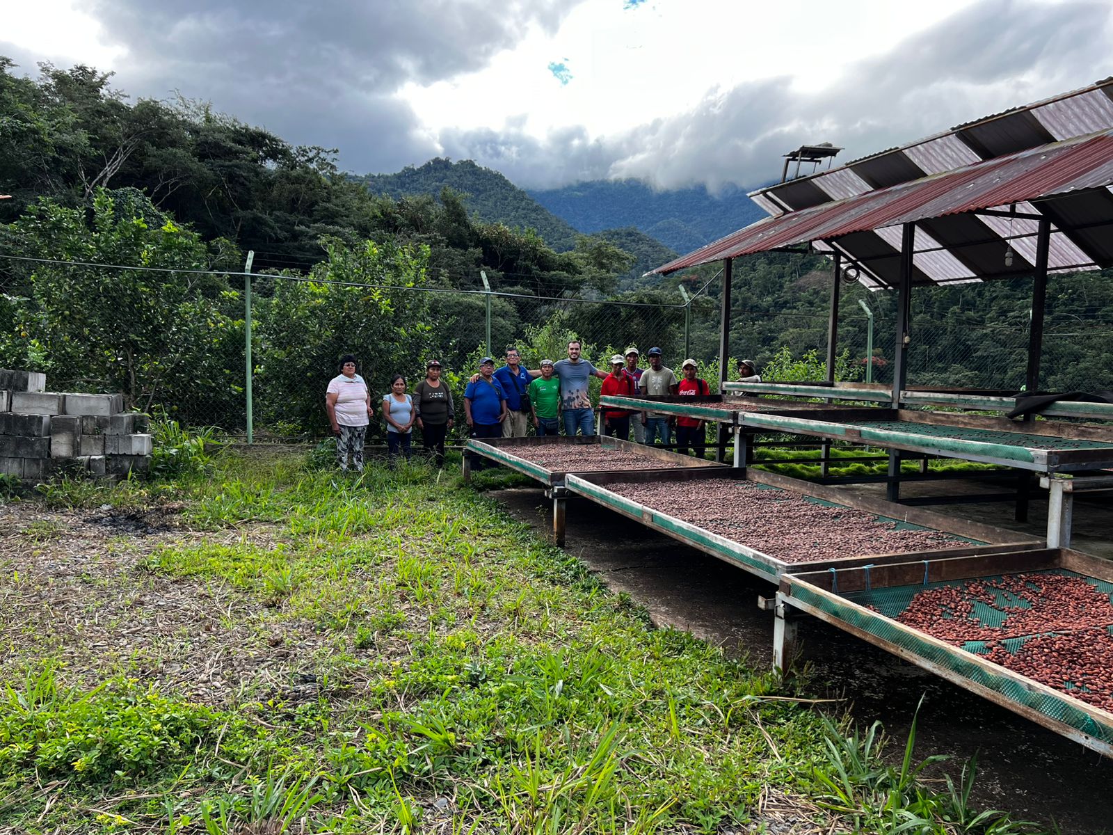 Cooperative members at the drying facility